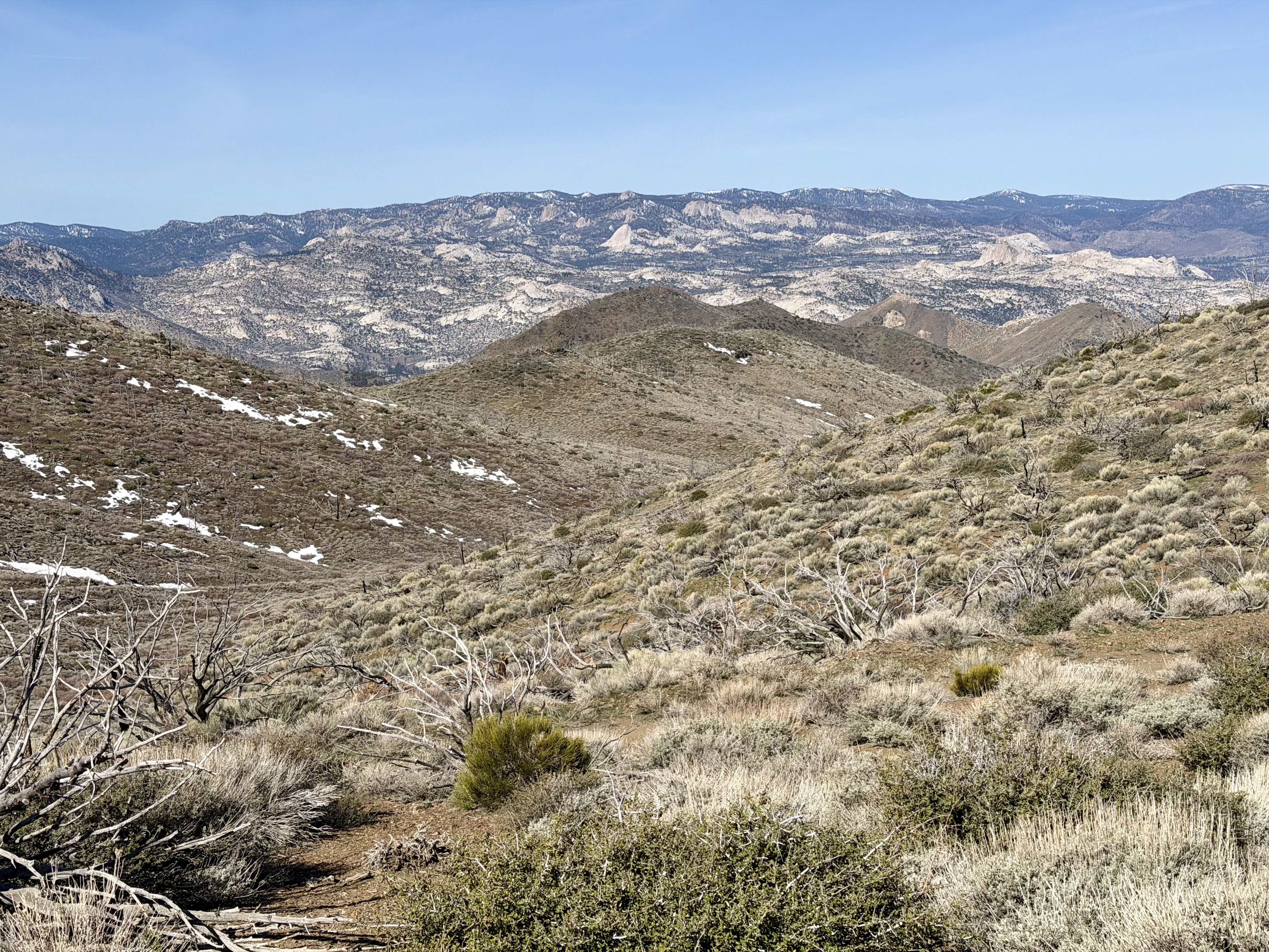Suddenly the horizon opens up and a granite plateau comes into view — Domeland in the distance
